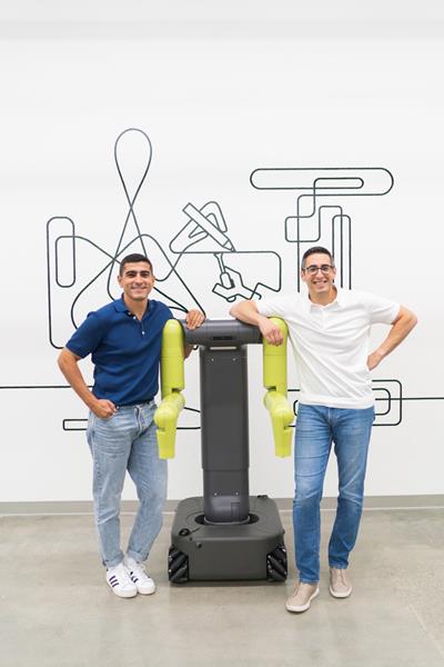 Maven Robotics founders Hamza Derbas and Khalid Derbas standing beside the company name