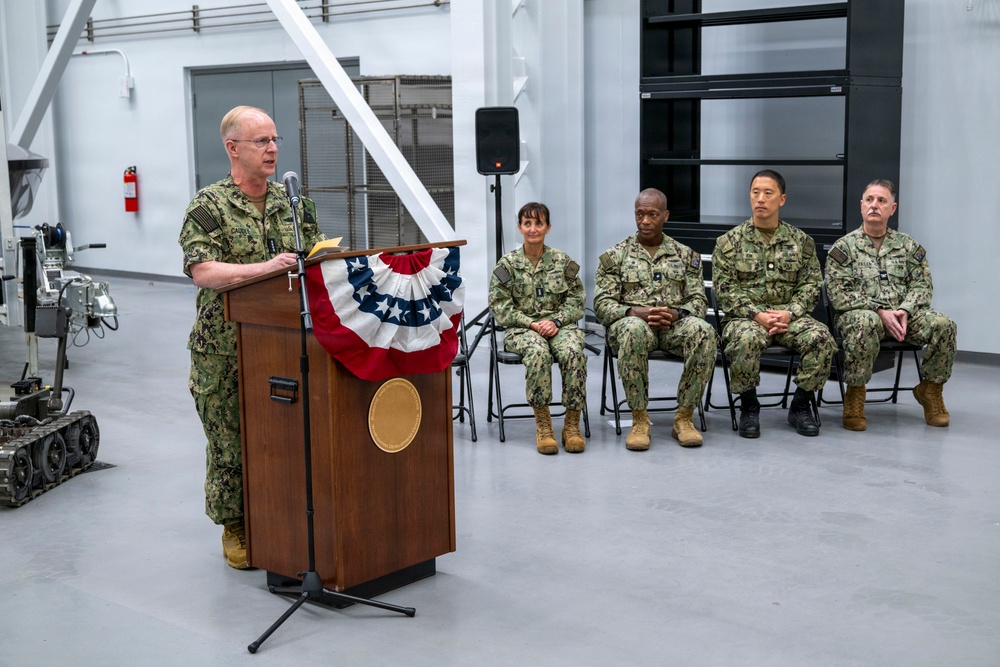 Chief of Naval Operations Adm. Daryl Caudle speaks at the RASWDC ribbon-cutting ceremony in Norfolk, Virginia